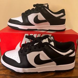 Black and White Nike Dunks.  Female Size 9. New in box. Tried on but never worn.